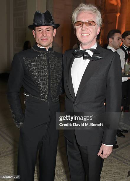 Stefan Bartlett and Philip Treacy attend the Alexander McQueen: Savage Beauty Fashion Gala at the V&A, presented by American Express and Kering on...