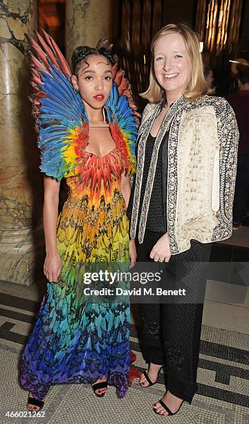 Twigs and Sarah Burton attend the Alexander McQueen: Savage Beauty Fashion Gala at the V&A, presented by American Express and Kering on March 12,...