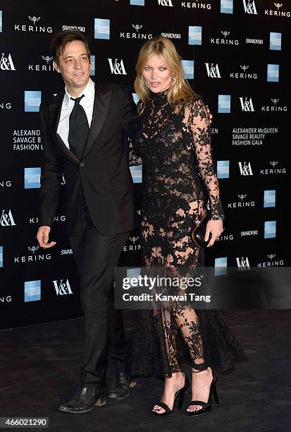 Jamie Hince and Kate Moss attend a private view for the "Alexander McQueen: Savage Beauty" exhibition at Victoria & Albert Museum on March 12, 2015...