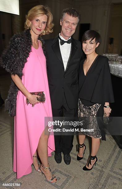 Pia Denis, Pierre Denis and Sandra Choi attend the Alexander McQueen: Savage Beauty Fashion Gala at the V&A, presented by American Express and Kering...