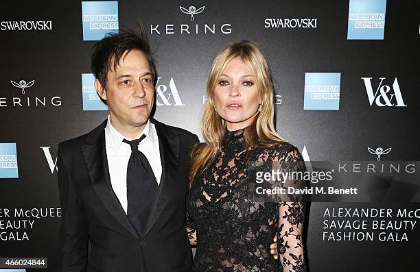 Jamie Hince and Kate Moss arrive at the Alexander McQueen: Savage Beauty Fashion Gala at the V&A, presented by American Express and Kering on March...