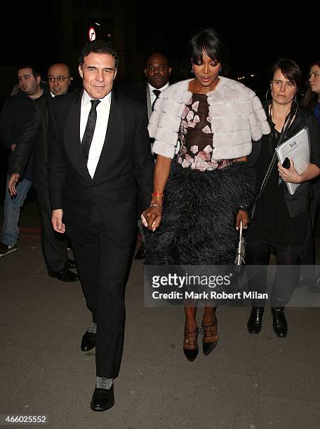 Andre Balazs and Naomi Campbell attend the Alexander McQueen: Savage Beauty Fashion Gala at the V&A on March 12, 2015 in London, England.