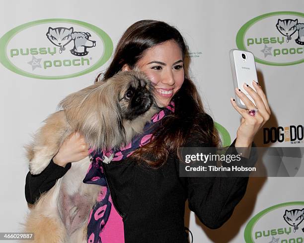 Adriana Michelle takes a selfie at the 'A Fur Affair' to benefit animal welfare superheroes at Pussy & Pooch Pet Lifestyle Center on January 30, 2014...