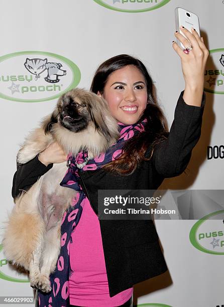 Adriana Michelle takes a selfie at the 'A Fur Affair' to benefit animal welfare superheroes at Pussy & Pooch Pet Lifestyle Center on January 30, 2014...