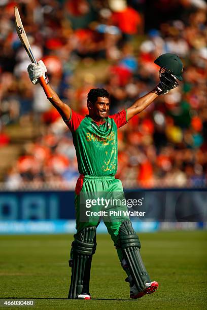 Mahmudullah of Bangladesh celebrates his century during the 2015 ICC Cricket World Cup match between Bangladesh and New Zealand at Seddon Park on...