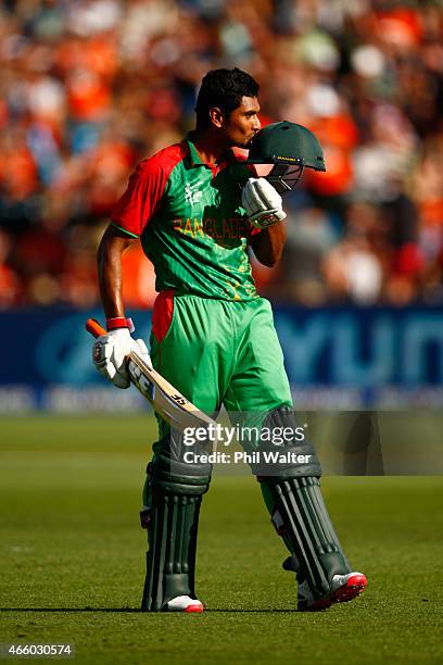 Mahmudullah of Bangladesh celebrates his century during the 2015 ICC Cricket World Cup match between Bangladesh and New Zealand at Seddon Park on...