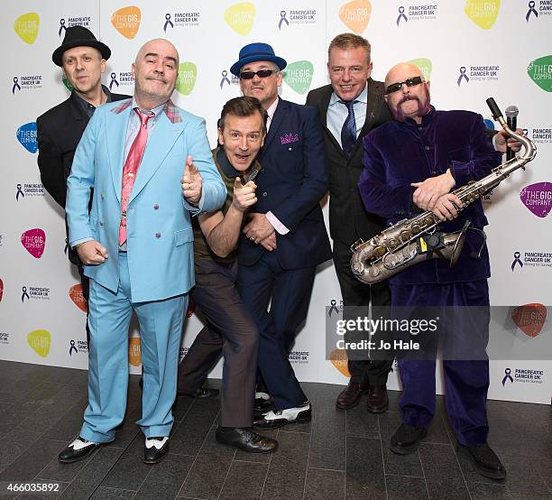 Graham McPherson aka 'Suggs' with Madness pose backstage in Aid of Pancreatic Cancer UK at Emirates Stadium on March 12, 2015 in London, United...