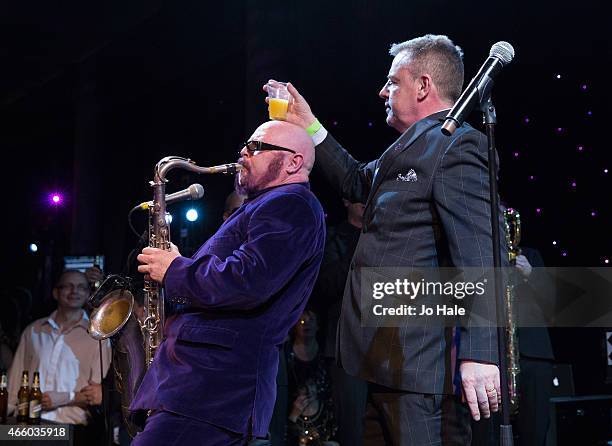 Graham McPherson aka 'Suggs' performs on stage with Madness at An Evening With Suggs & Friends' in aid of Pancreatic Cancer UK at Emirates Stadium on...