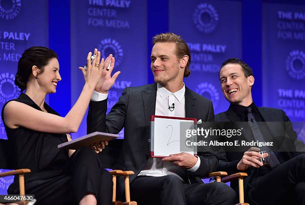 Actors Caitriona Balfe, Sam Heughan and Tobias Menzies attend The Paley Center for Media's 32nd Annual PALEYFEST LA "Outlander" at Dolby Theatre on...