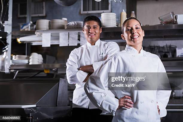 professional chefs - arms akimbo stock pictures, royalty-free photos & images