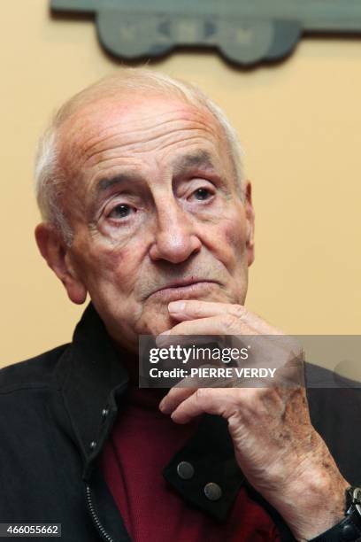 French glaciologist Claude Lorius talks in a Paris hotel, on January 7 during an interview. The scientist, a climate pioneer, who received in 2008...