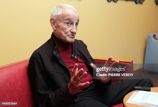French glaciologist Claude Lorius talks in a Paris hotel, on January 7 during an interview. The scientist, a climate pioneer, who received in 2008...