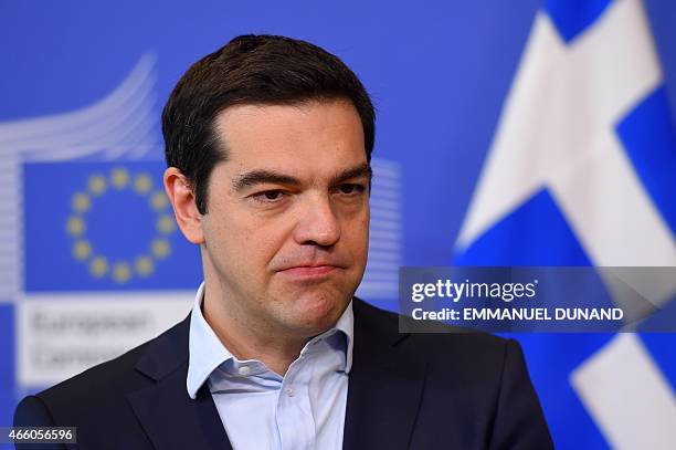 Greece's Prime Minister Alexis Tsipras pays a visit to the European Commission in Brussels on March 13, 2015. Tsipras is in Brussels for talks on...