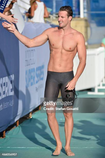 James Magnussen of Australia acknowledges the crowd after winning the Men's 100 Metre Freestyle event during the 2014 Aquatic Super Series on January...
