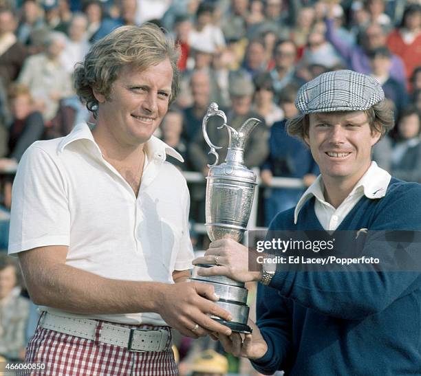 Runner-up Jack Newton of Australia and winner Tom Watson of the United States with the trophy during the British Open Golf Championship at Carnoustie...