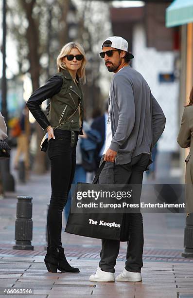 Real Madrid football player Sami Khedira and Lena Gercke are seen on March 12, 2015 in Madrid, Spain.