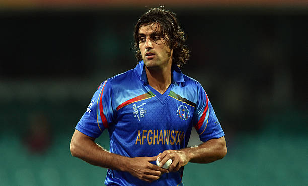 Afghanistan's paceman Shapoor Zadran prepares to bowl against Afghanistan during the 2015 Cricket World Cup Pool A match between England and...