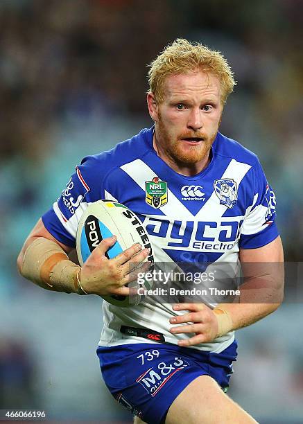 James Graham of the Bulldogs runs the ball during the round two NRL match between the Canterbury Bulldogs and the Parramatta Eels at ANZ Stadium on...