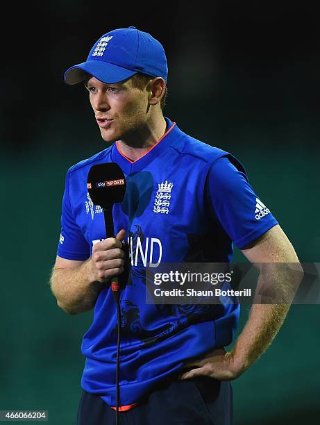 England captain Eoin Morgan talks to the media after the 2015 Cricket World Cup match between England and Afghanistan at Sydney Cricket Ground on...