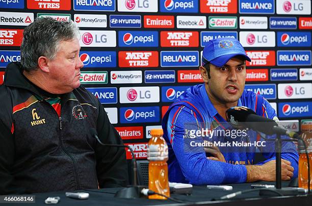 Afghanistan coach Andy Moles and Afghanistan captain Mohammad Nabi speak to the media during the 2015 Cricket World Cup match between England and...