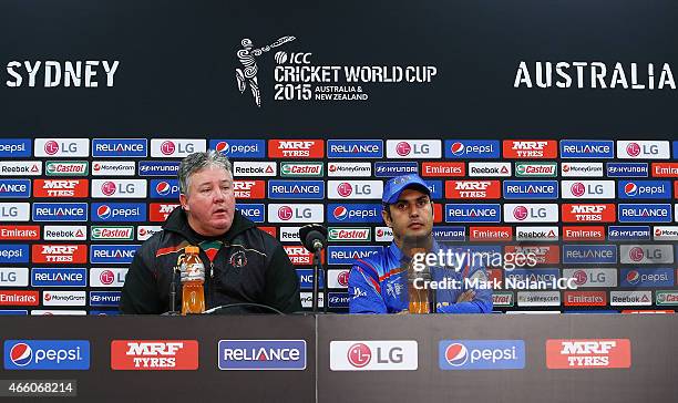 Afghanistan coach Andy Moles and Afghanistan captain Mohammad Nabi speak to the media during the 2015 Cricket World Cup match between England and...