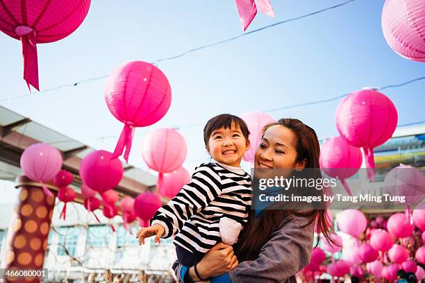 mom & toddler girl looking at the chinese lanterns - china lantern stock pictures, royalty-free photos & images