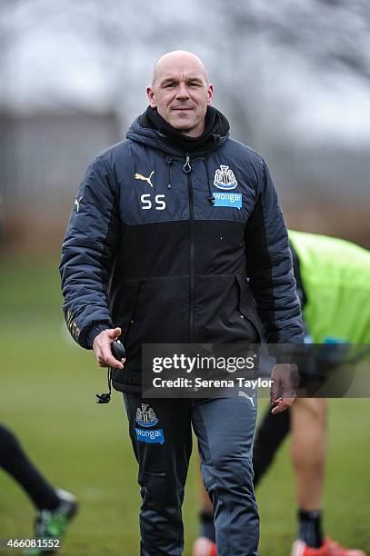 First Team Coach Steve Stone walks on the pitch during a Newcastle United Training session at The Newcastle United Training Centre on March 13 in...