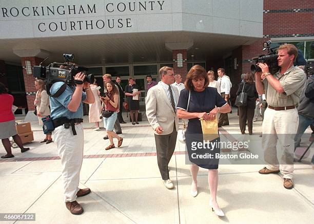 Linda Wojas, right, and her husband John leave the courthouse after their daughter Pamela Smart's hearing at Rockingham County Court.