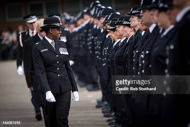 New recruits to the Metropolitan Police Service are inspected by Deputy Director of Training Superintendent Robyn Williams during their 'Passing Out...