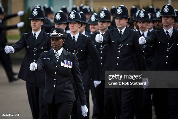 Deputy Director of Training Superintendent Robyn Williams leads new recruits to the Metropolitan Police Service during their 'Passing Out Parade' at...