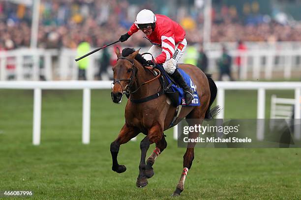 Nico de Boinville riding Coneygree powers to victory in the Betfred Cheltenham Gold Cup during day four of the Cheltenham Festival at Cheltenham...