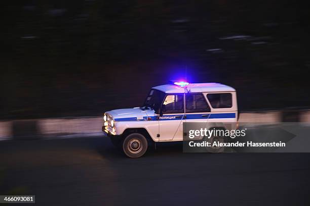 Police car is pictured in the Rosa Khutor Mountain Cluster village ahead of the Sochi 2014 Winter Olympics on January 31, 2014 in Rosa Khutor, Sochi,...