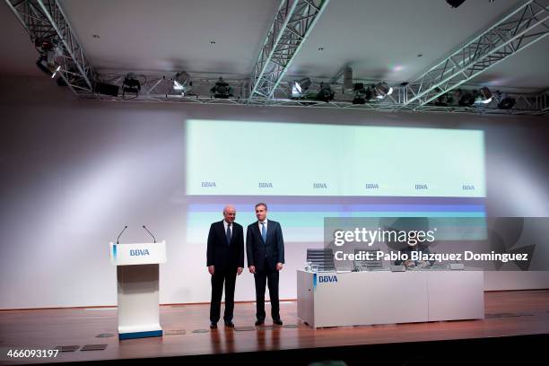 Chairman Francisco Gonzalez and BBVA president and chief operating officer Angel Cano arrive to a press conference announcing the 2013 full-year...