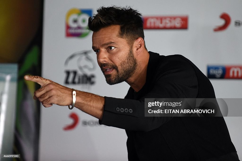 Puerto Rican Singer Ricky Puerto Rican pop singer Ricky Martin poses as he arrives for a press ...