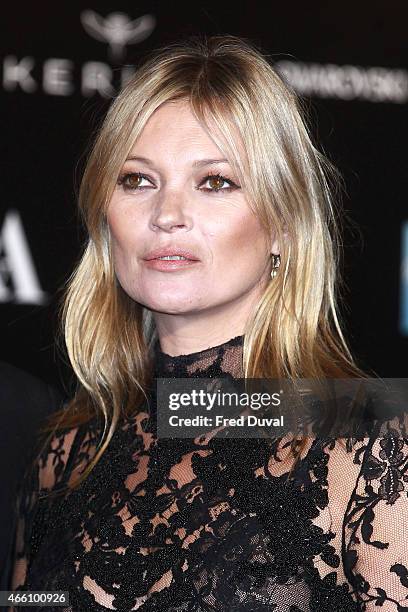 Model Kate Moss attends a private view for the "Alexander McQueen: Savage Beauty" exhibition at Victoria & Albert Museum on March 12, 2015 in London,...