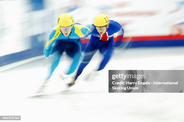 Denis Nikisha of Kazakhstan and Jack Whelbourne of Great Britain in action during the Men's 500m Preliminaries on day one of the ISU World Short...