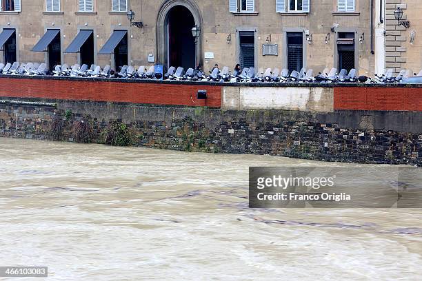 View of the high water levels on the Arno River taken from Santa Trinita bridge on January 31, 2014 on Florence, Italy. Many areas of central and...