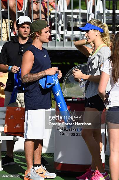 Justin Bieber and Eugenie Bouchard attend the 11th Annual Desert Smash Hosted By Will Ferrell Benefiting Cancer For College at La Quinta Resort and...