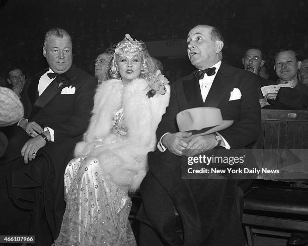 Golden Gloves Tournament of champions at Madison Square Garden - Boris Petroff and Mae West attend the fights.