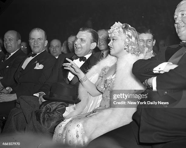 Golden Gloves Tournament of champions at Madison Square Garden - Boris Petroff and Mae West attend the fights.