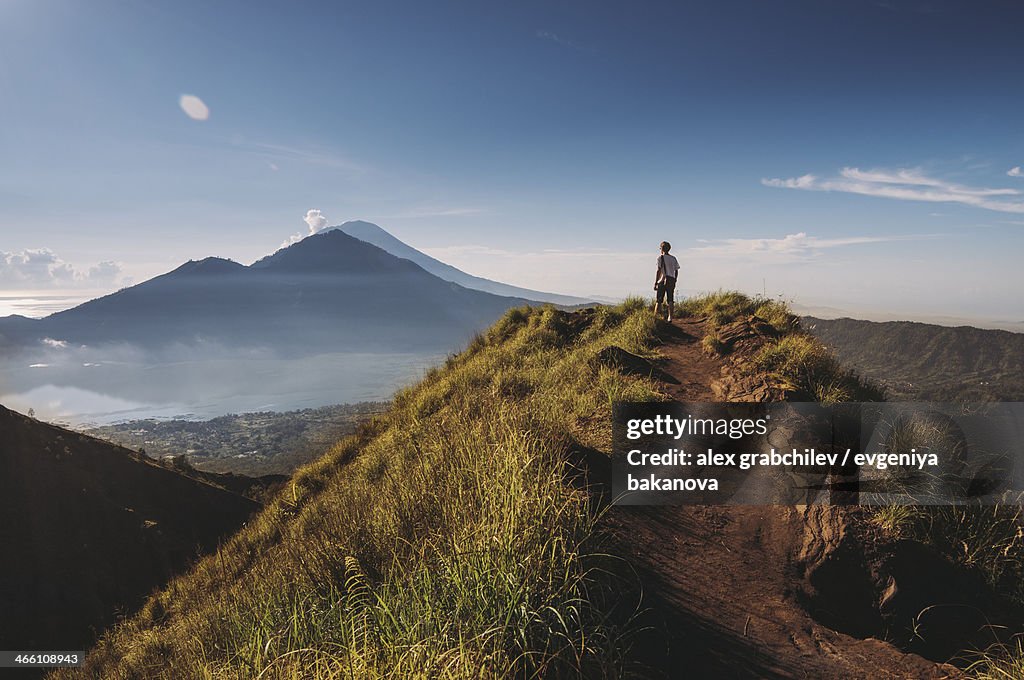 Hiker staying on top of  Mount Batur