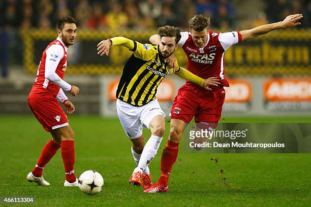 Davy Propper of Vitesse and Viktor Elm of AZ battle for the ball during the Dutch Eredivisie match between Vitesse Arnhem and AZ Alkmaar held at...