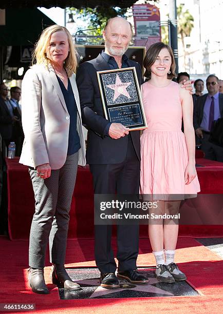 Amy Madigan, Ed Harris and Lily Dolores Harris attend The Hollywood Walk of Fame ceremony honoring Ed Harris at Hollywood Walk Of Fame on March 13,...