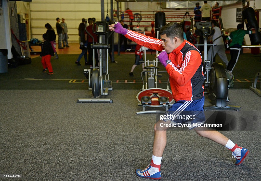 Golden Gloves boxer Julio Para , who fights at 132 pounds, shadow boxes as he begins training at the Colorado Golden Gloves Gym in Wheat Ridge. Para will soon be competing in Colorado's State Golden Gloves Tournament.