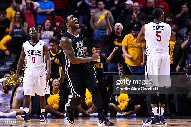 Mo Alie-Cox of the Virginia Commonwealth Rams celebrates a basket during a quarterfinal game against the Richmond Spiders in the 2015 Men's Atlantic...