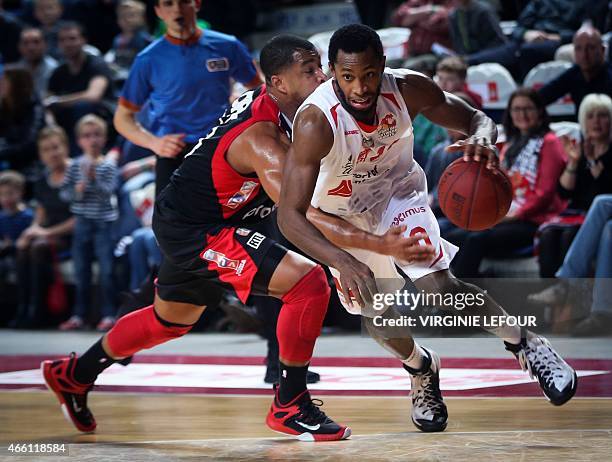 Charleroi's Josh Bostic vies for the ball with Antwerp's Kyle Foggduring the basketball match between Antwerp Giants and Spirou Charleroi, on day 2...