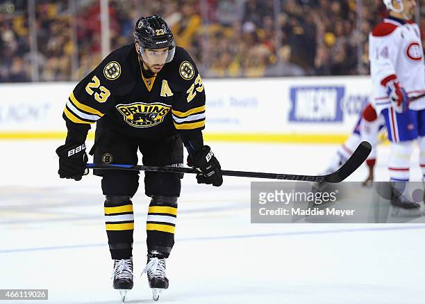 Chris Kelly of the Boston Bruins looks on during the second period against the Montreal Canadiens at TD Garden on February 8, 2015 in Boston,...