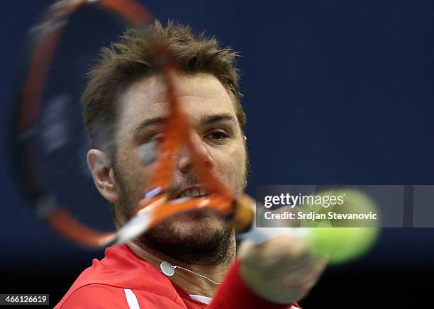 Stanislas Wawrinka of Switzerland plays a forehand against Dusan Lajovic of Serbia during day one of the Davis Cup match between Serbia and...