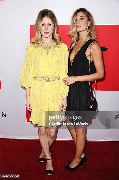 Actress Hanna Alstrom and Cecilia Forss attend the premiere of "The Gunman" at Regal Cinemas L.A. Live on March 12, 2015 in Los Angeles, California.