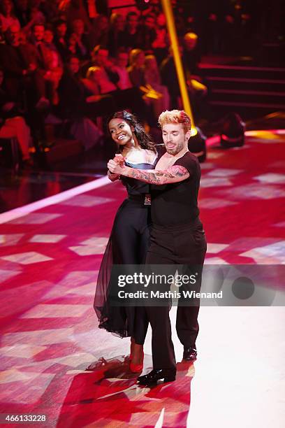 Daniel Kuebelboeck and Otlile Mabuse perform on stage during the 1st show of the television competition 'Let's Dance' on March 13, 2015 in Cologne,...